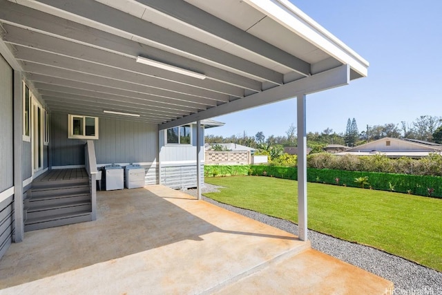 view of patio / terrace featuring washer and dryer