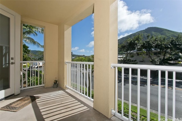 balcony featuring a mountain view