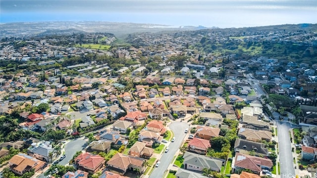 birds eye view of property with a residential view