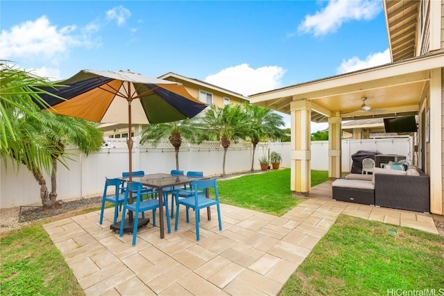 view of patio featuring outdoor dining area and a fenced backyard