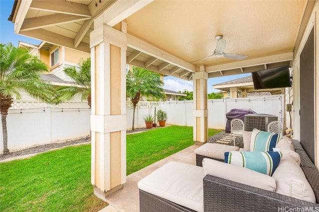 view of patio / terrace with outdoor lounge area, a ceiling fan, and a fenced backyard