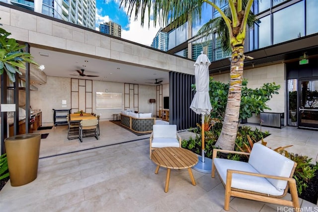 view of patio / terrace featuring ceiling fan and outdoor lounge area