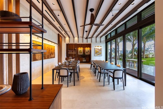 dining room featuring a ceiling fan and french doors