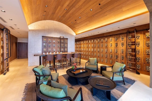 wine area featuring vaulted ceiling, wooden ceiling, mail area, and recessed lighting