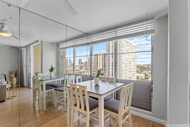 dining area featuring wood finished floors