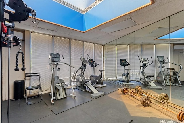 gym with a drop ceiling