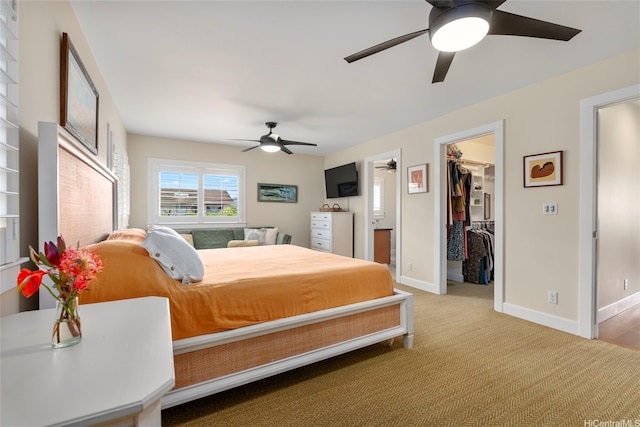 66-158A Haleiwa Rd, Haleiwa, HI 96712 - carpeted bedroom featuring a spacious closet, baseboards, a ceiling fan, and a closet