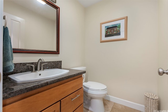 66-158A Haleiwa Rd, Haleiwa, HI 96712 - half bathroom featuring toilet, vanity, tile patterned floors, and baseboards
