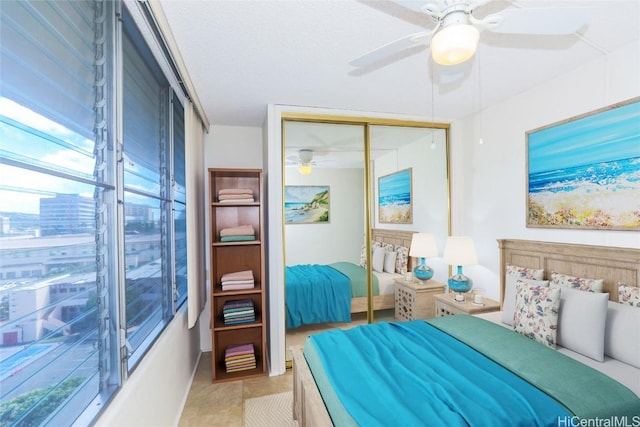 bedroom featuring a closet and ceiling fan