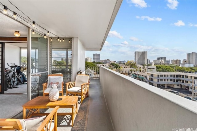 balcony featuring a city view