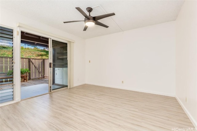 unfurnished room with ceiling fan, baseboards, and wood finished floors