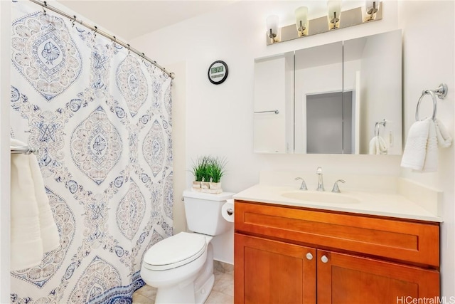 full bathroom featuring toilet, a shower with curtain, tile patterned flooring, and vanity