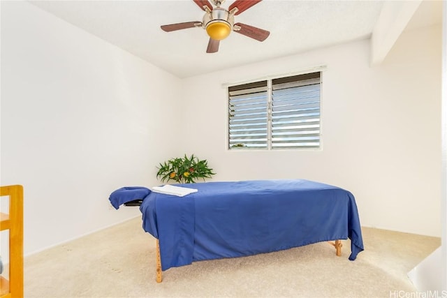 bedroom featuring ceiling fan and carpet flooring