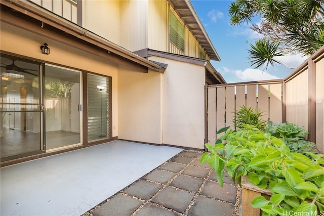 view of patio featuring fence