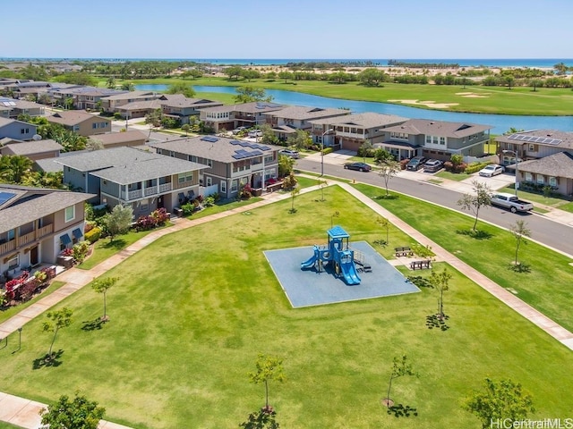 bird's eye view with a residential view and a water view