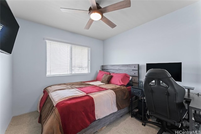 bedroom with ceiling fan and carpet floors