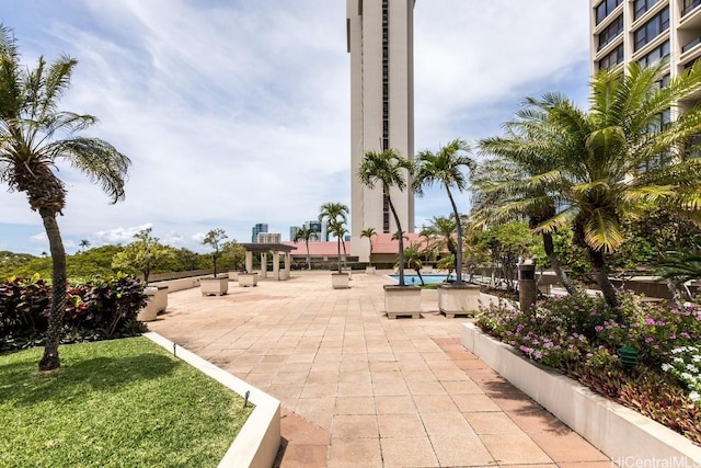 view of home's community featuring a patio area