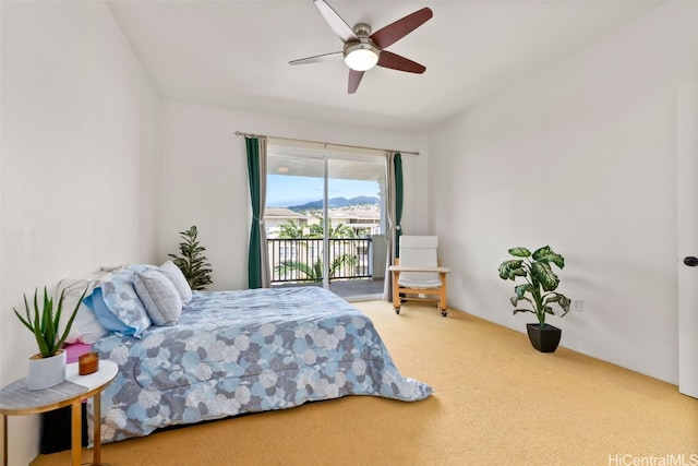 bedroom with access to outside, carpet, and ceiling fan