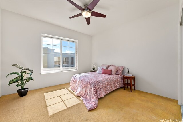 bedroom featuring carpet flooring and a ceiling fan