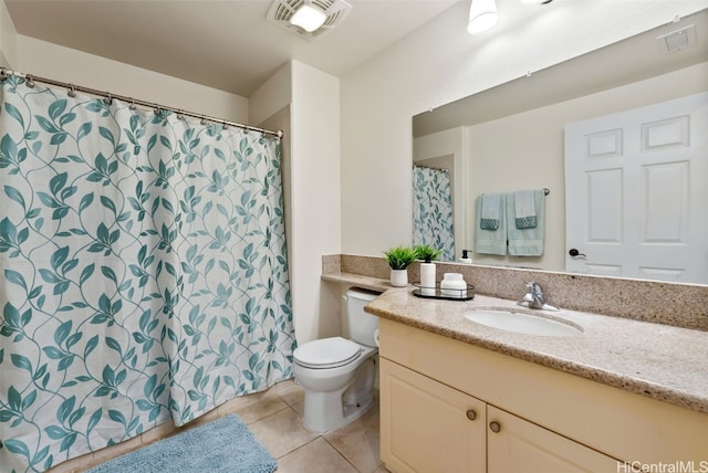 full bathroom featuring tile patterned floors, visible vents, toilet, and vanity