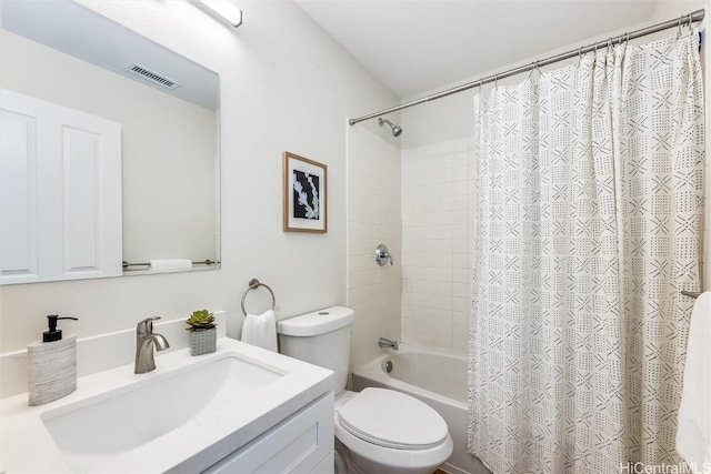 full bathroom with shower / bath combo, visible vents, vanity, and toilet