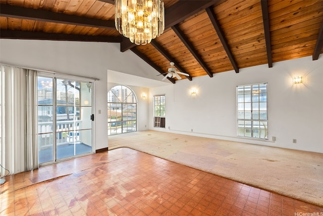 unfurnished living room featuring wood ceiling, carpet floors, beamed ceiling, a chandelier, and tile patterned floors