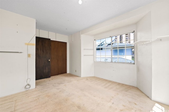 unfurnished bedroom with carpet floors