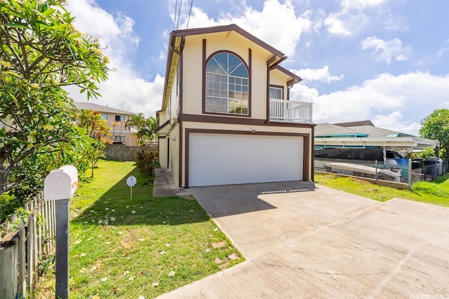 view of front of house with a garage, stucco siding, and driveway