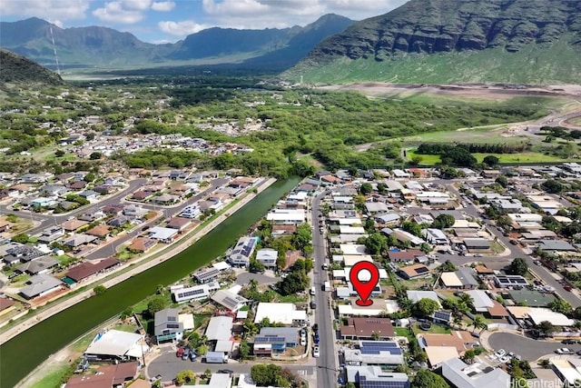 birds eye view of property with a residential view and a mountain view