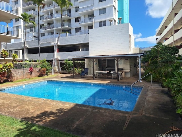 pool featuring a patio area