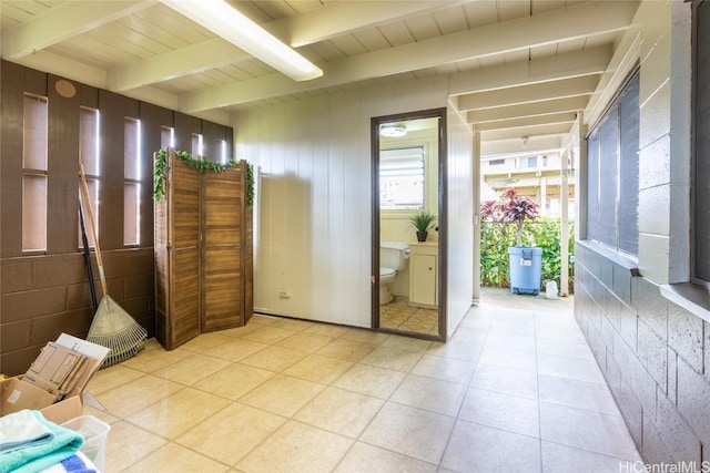 interior space featuring wooden ceiling and beamed ceiling