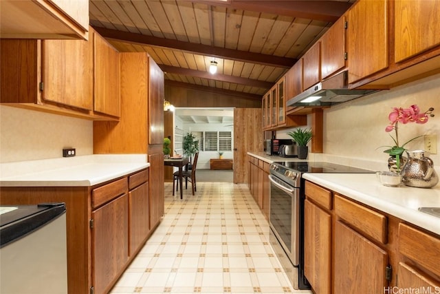 kitchen featuring light floors, stainless steel electric range oven, under cabinet range hood, and light countertops