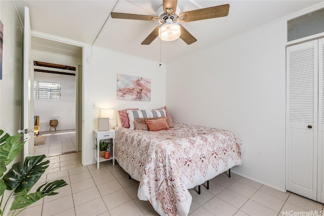 bedroom with light tile patterned floors and ceiling fan