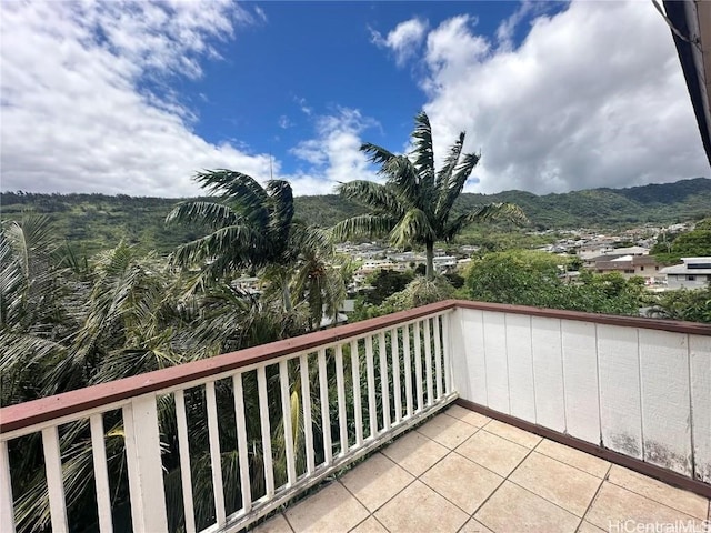 balcony featuring a mountain view