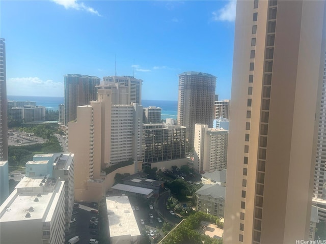 property's view of city featuring a water view