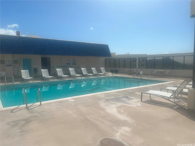 community pool featuring a patio