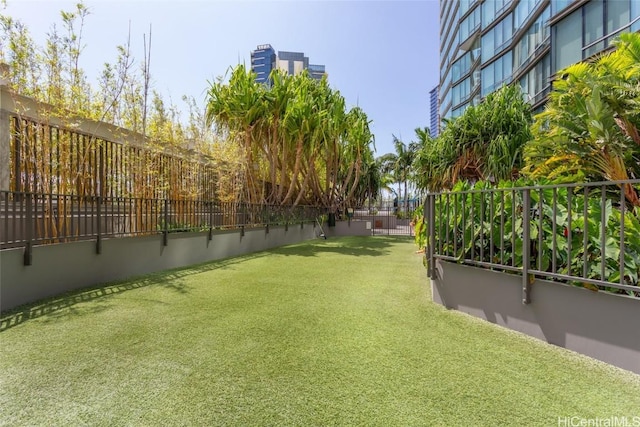 view of yard featuring fence