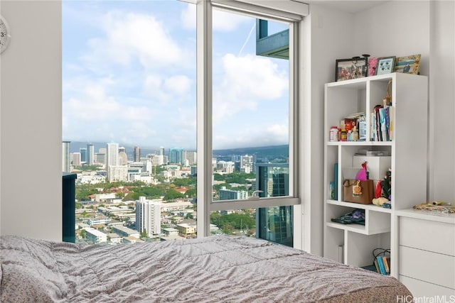 bedroom featuring a view of city