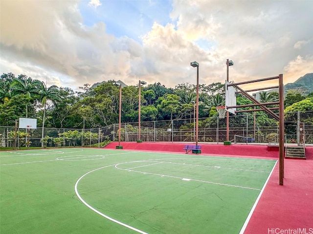 view of sport court with community basketball court and fence