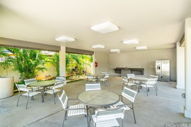 view of patio with outdoor dining space