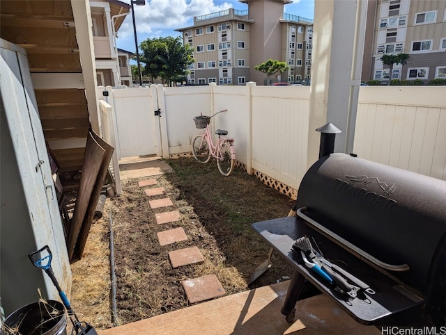 view of yard featuring a gate and fence