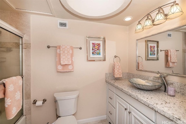 311 Ohua Ave Unit Ph D, Honolulu, HI 96815 - bathroom with visible vents, toilet, vanity, and baseboards