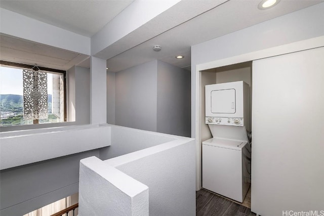 311 Ohua Ave Unit Ph D, Honolulu, HI 96815 - clothes washing area featuring recessed lighting, dark wood-type flooring, laundry area, and stacked washer / dryer