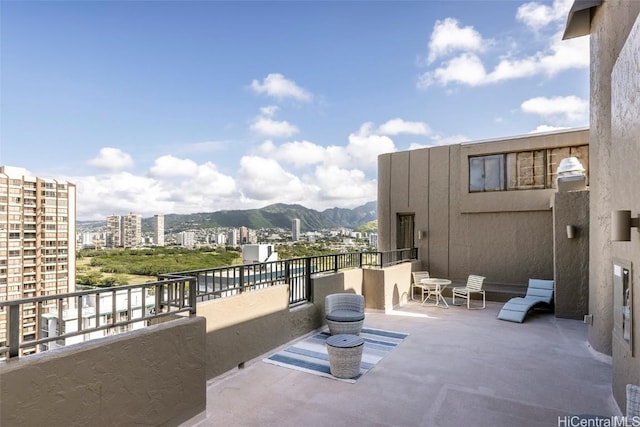 311 Ohua Ave Unit Ph D, Honolulu, HI 96815 - view of patio / terrace featuring a mountain view, a view of city, and a balcony