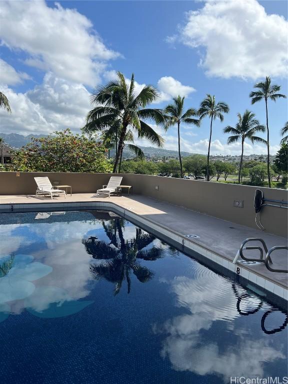 311 Ohua Ave Unit Ph D, Honolulu, HI 96815 - community pool featuring a patio