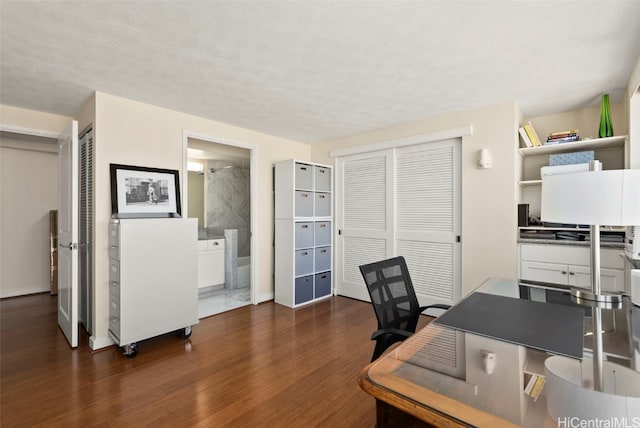 home office with dark wood finished floors