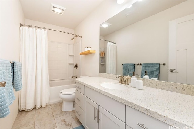 bathroom featuring toilet, shower / tub combo, visible vents, and vanity