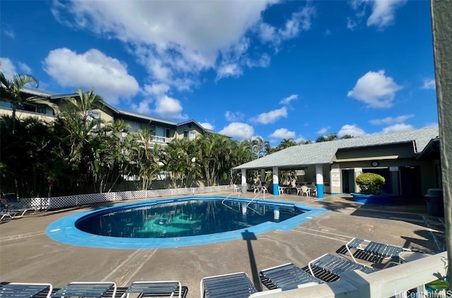 pool featuring a patio area