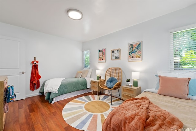 bedroom featuring wood finished floors