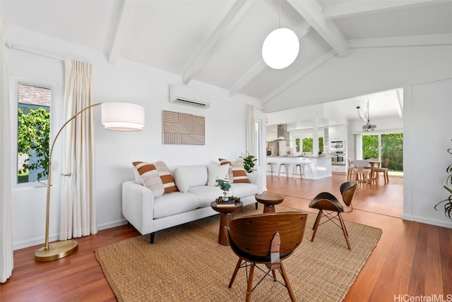 living area with high vaulted ceiling, beam ceiling, a wall mounted air conditioner, and wood finished floors